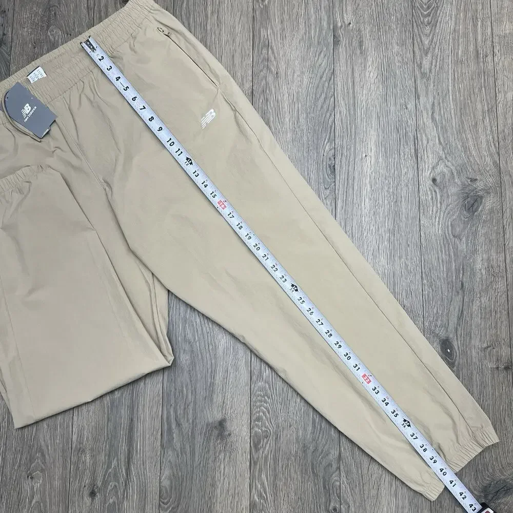 New Balance Jogger Pants Size 2XL Mens Stoneware Beige Athletic Stretch Woven
